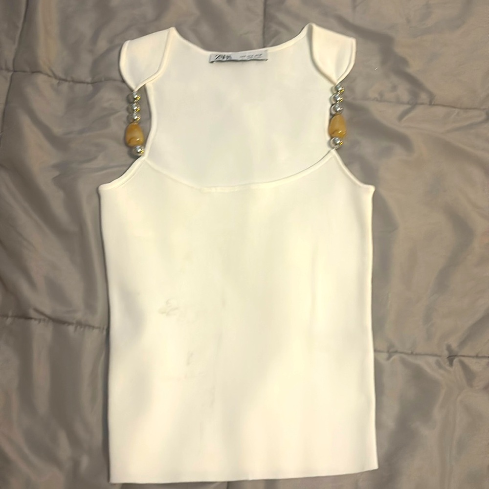 tank white zara shirt with small stain (shown in slide #2) and beaded at the top